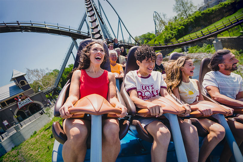 Hersheypark family riding Candymonium together front row.