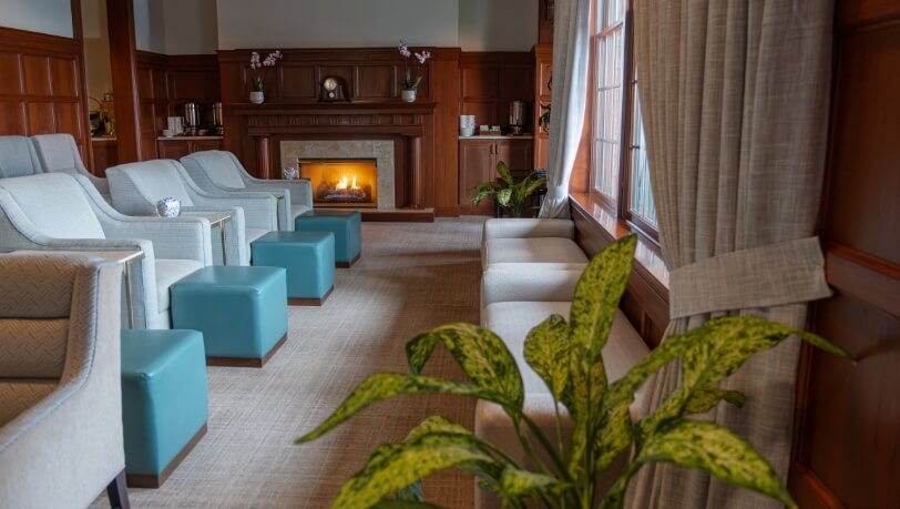 The Spa at Hotel Hershey lobby area with sitting chairs by the window.