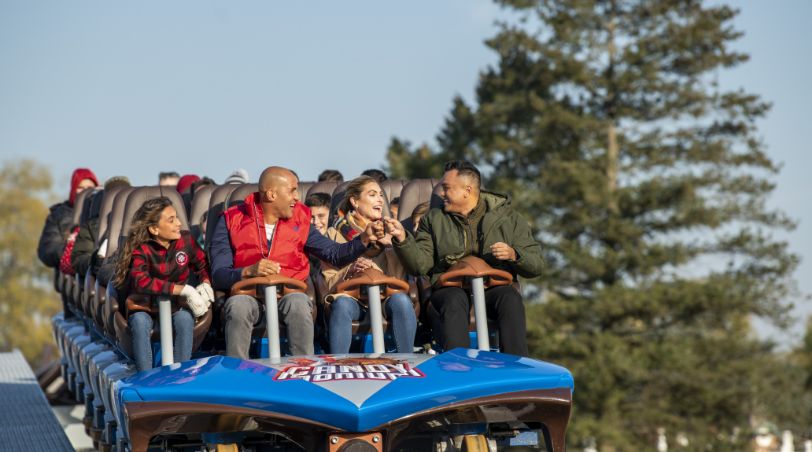 Group of friends riding front row Candymonium together.